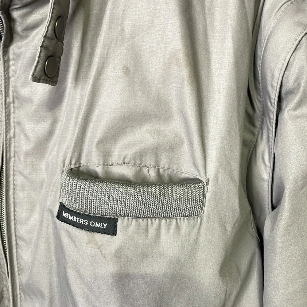 Members Only winter jacket with zip off sleeves converts to vest